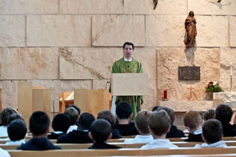 Fr. Joseph delivers a homily at his Form's class mass (2010).
